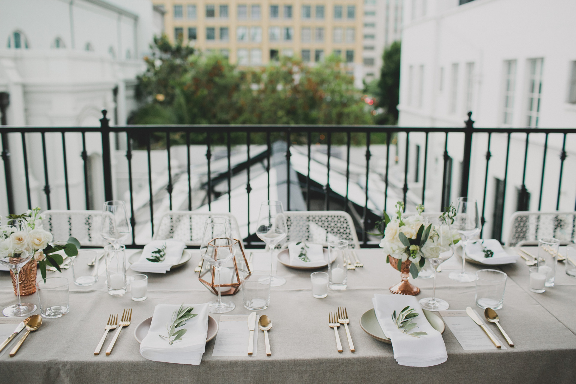 A contemporary dinner placement setting outdoors