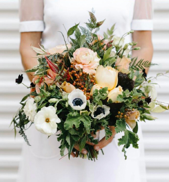 closeup of bride holding a bouquet of flowers