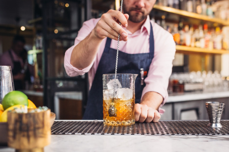 bartender mixing old fashion