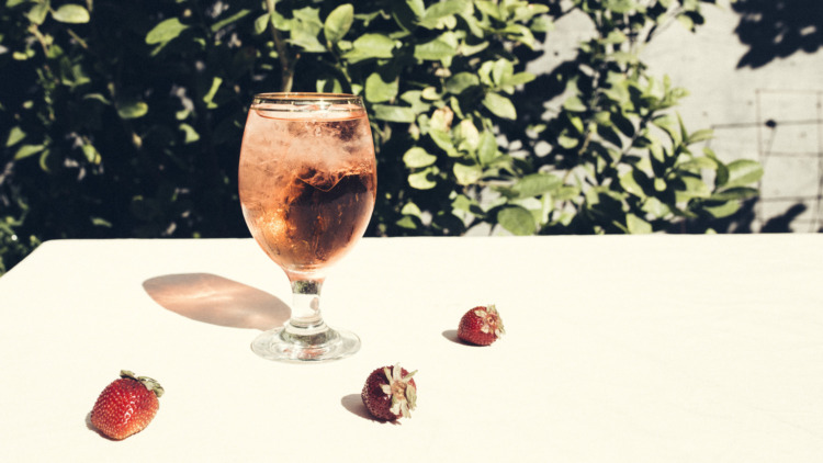 spritz with strawberries on a table