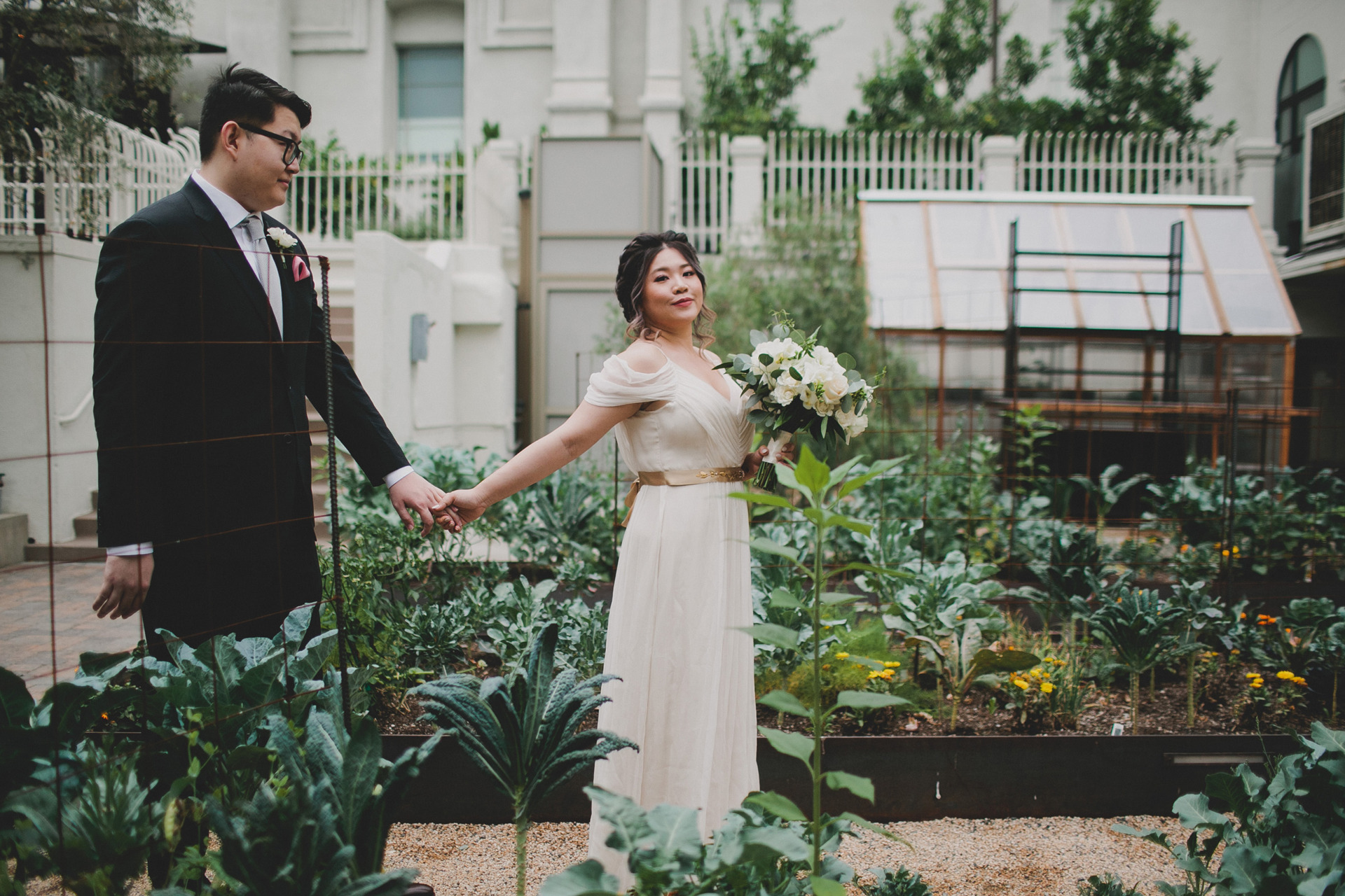 bride and groom in garden