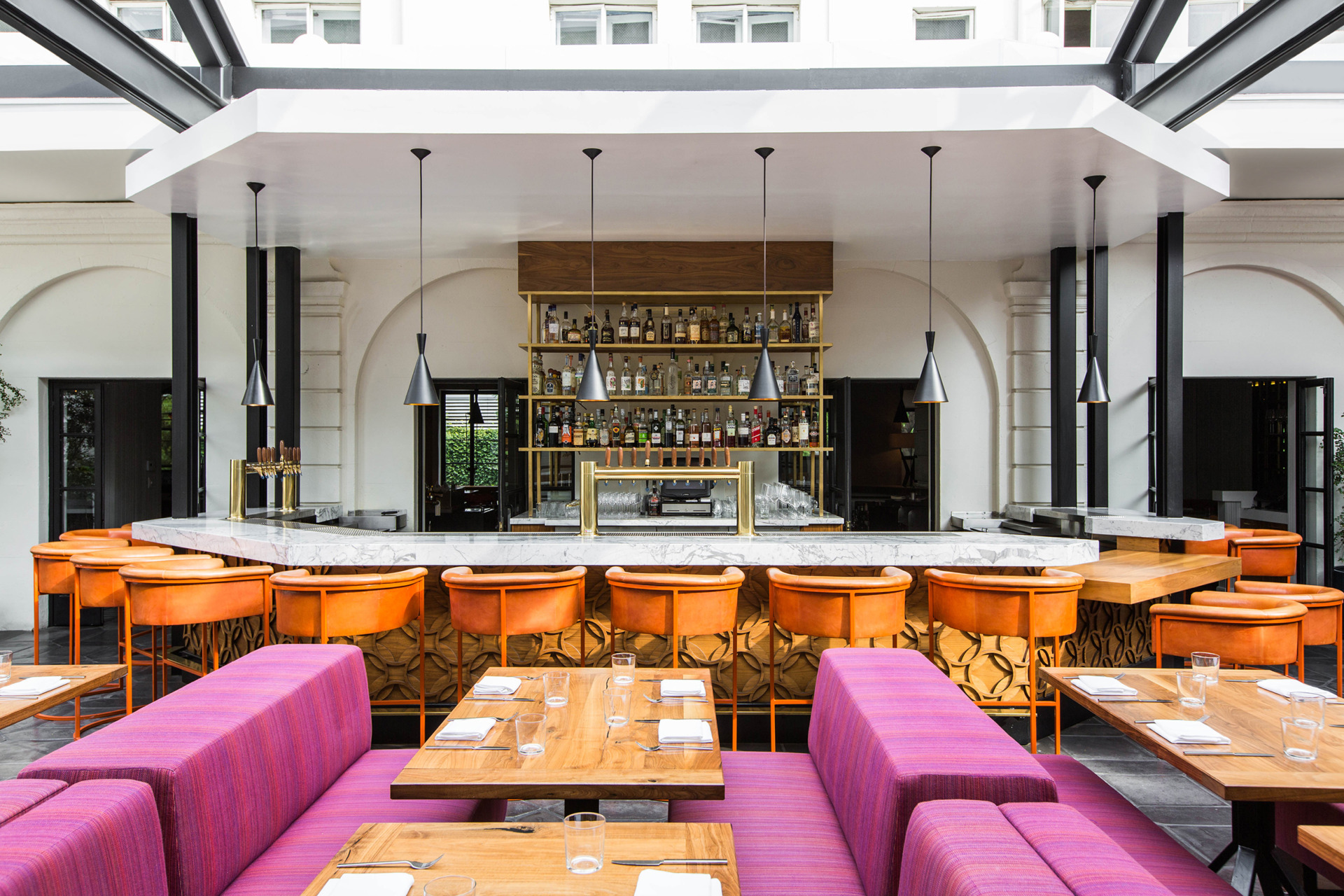 redbird bar with many stools