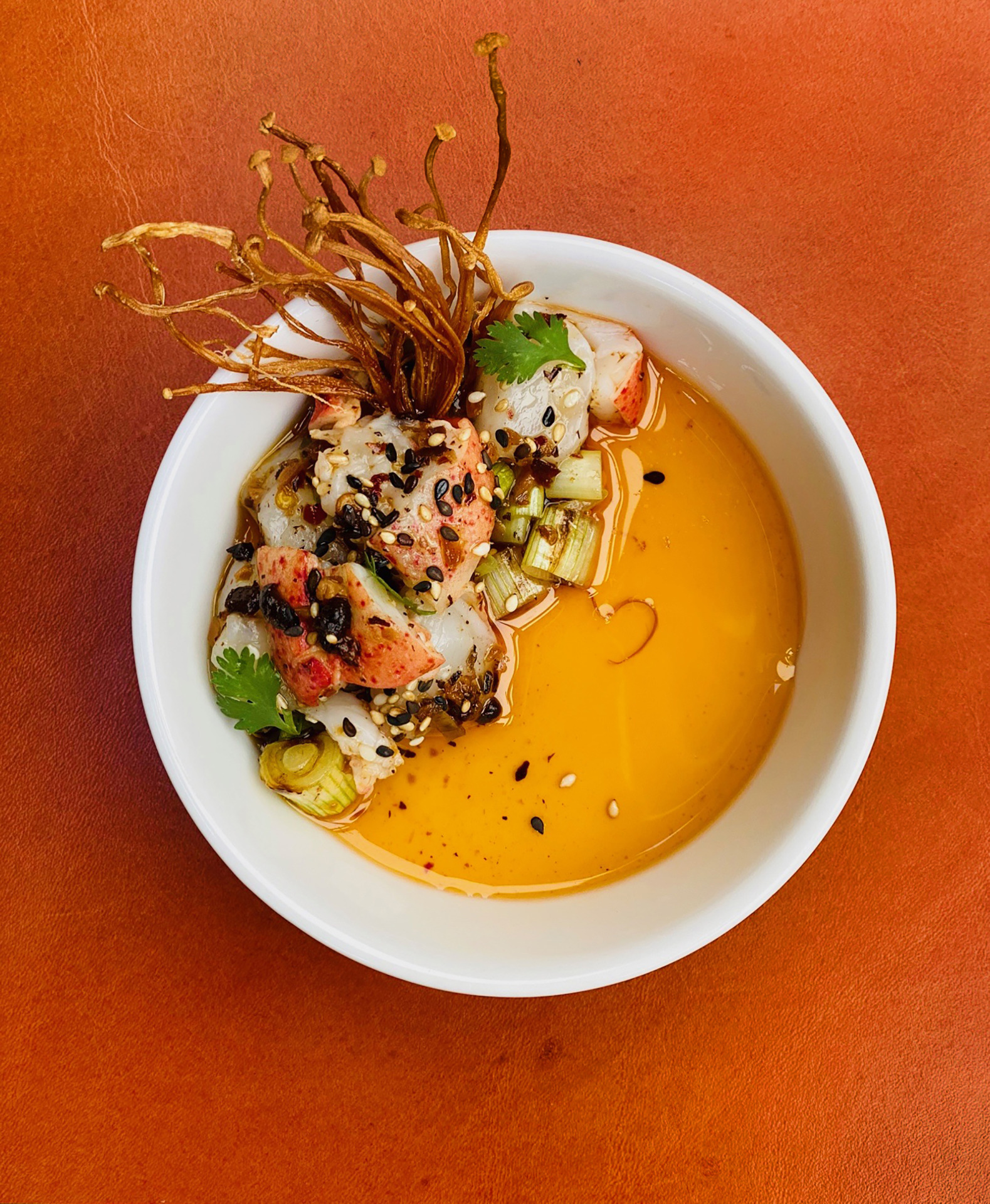 lobster chawamushi on orange surface