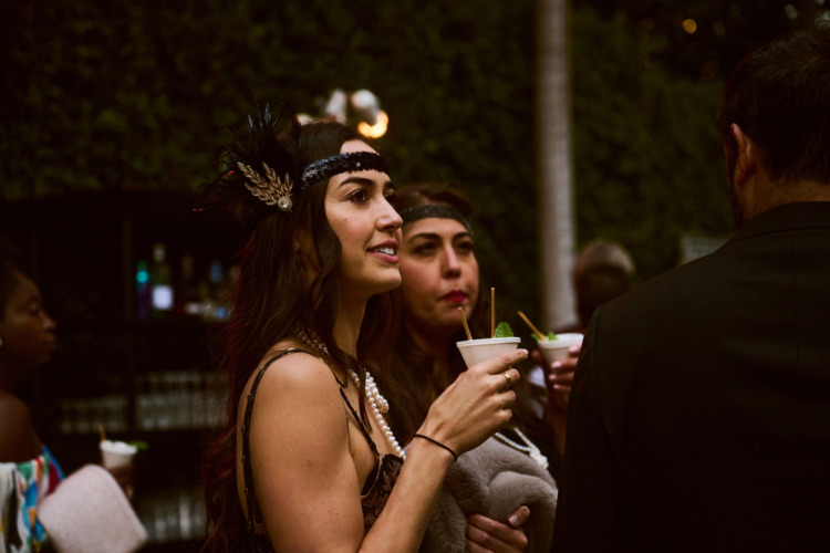 woman holding a snow cone