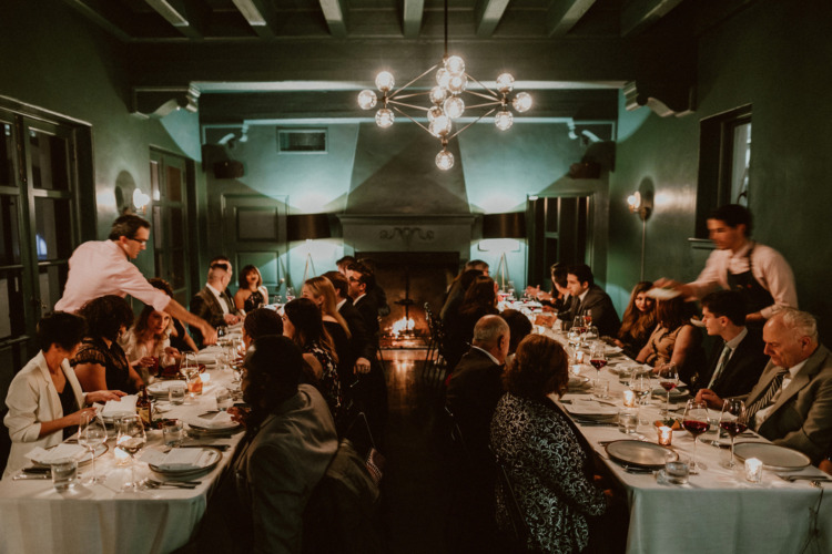 tables eating and guests being served