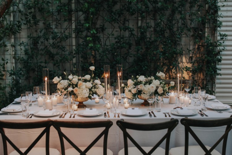 tables with candles and florals