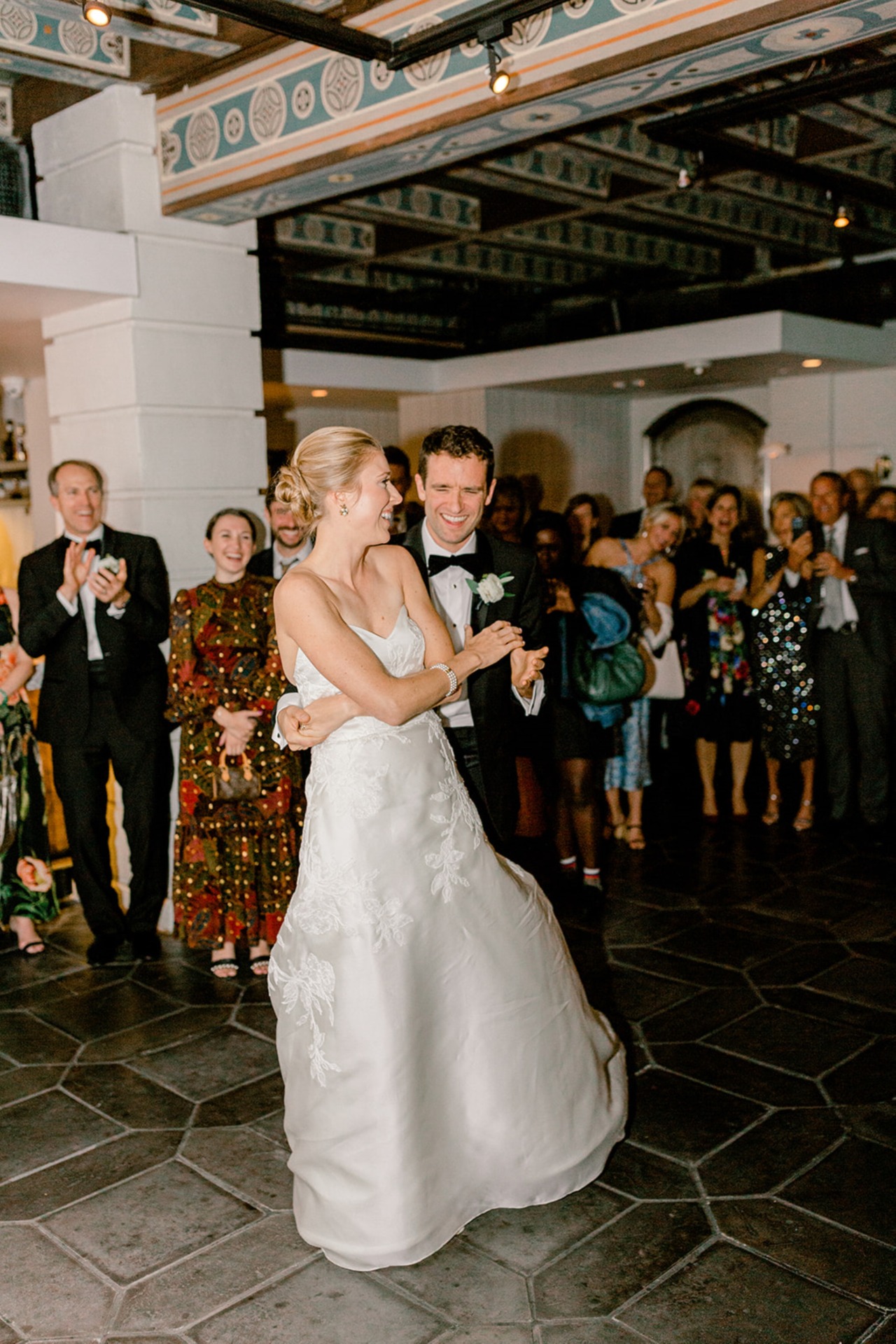 bride and groom dancing