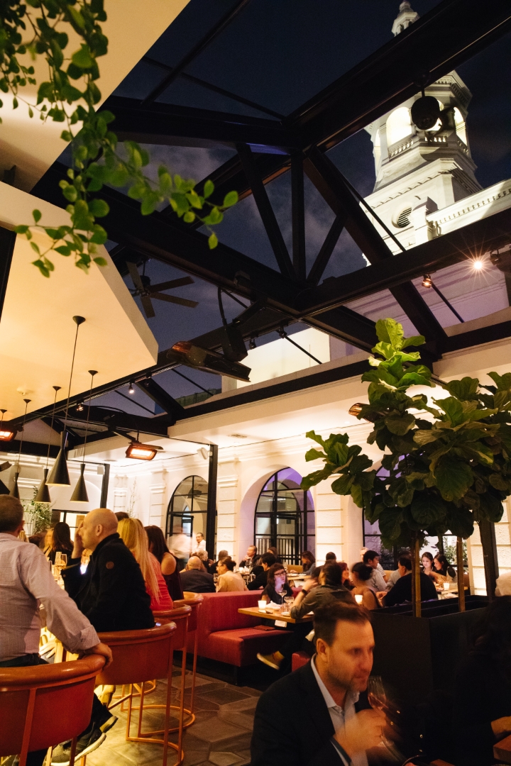 people dining in the Redbird Main Dining Room at night