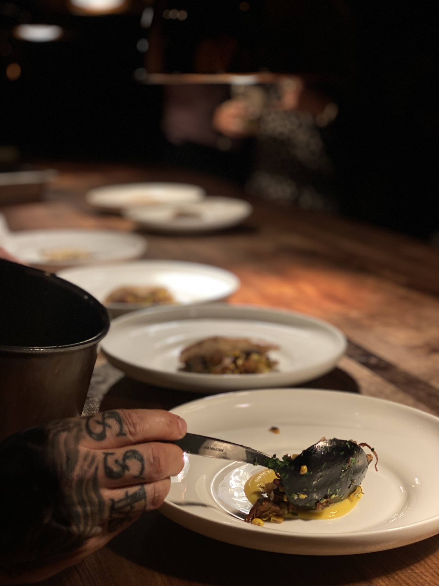 a hand prepping food