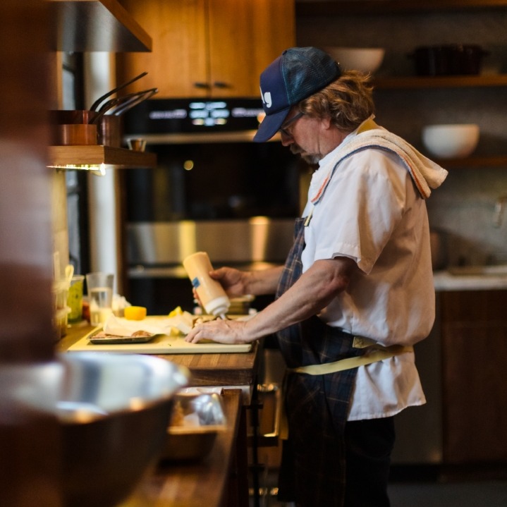 Redbird's Head Chef, Chef Neal Fraser, preparing hors d'oeuvres at a private event in The Nest kitchen