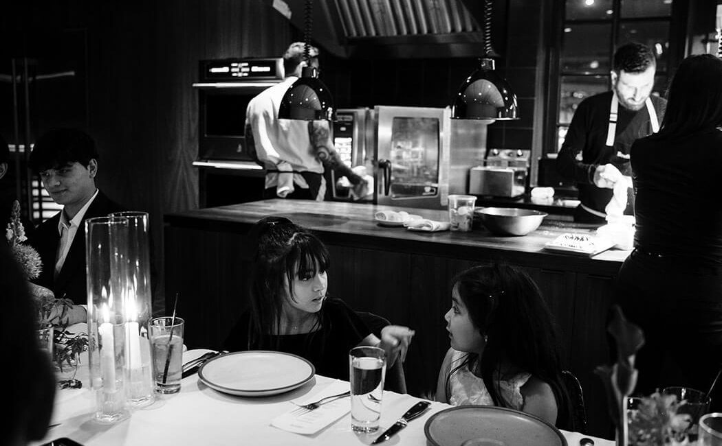 Diners and chefs in the East Room at Redbird | Vibiana