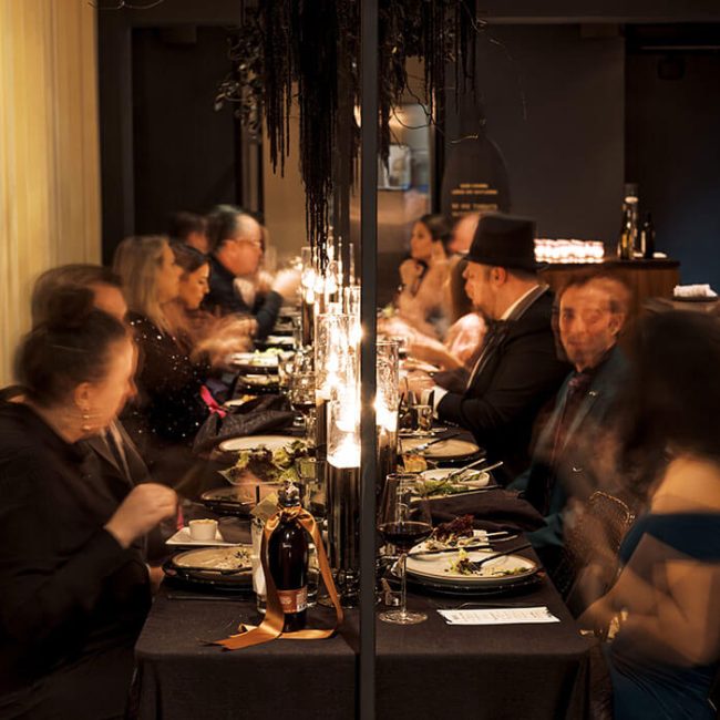 Guests dining in the East Room at Redbird | Vibiana