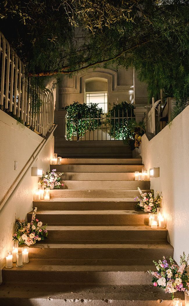 Candlelit steps leading into The Garden at Redbird | Vibiana