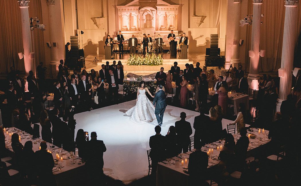 A wedding couple dancing in the Vibiana Main Hall at Redbird | Vibiana