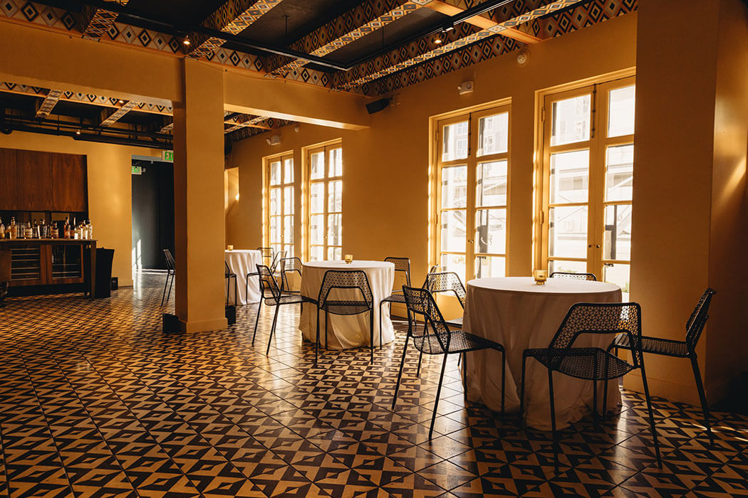 A cocktail reception layout in The West Room at Redbird | Vibiana