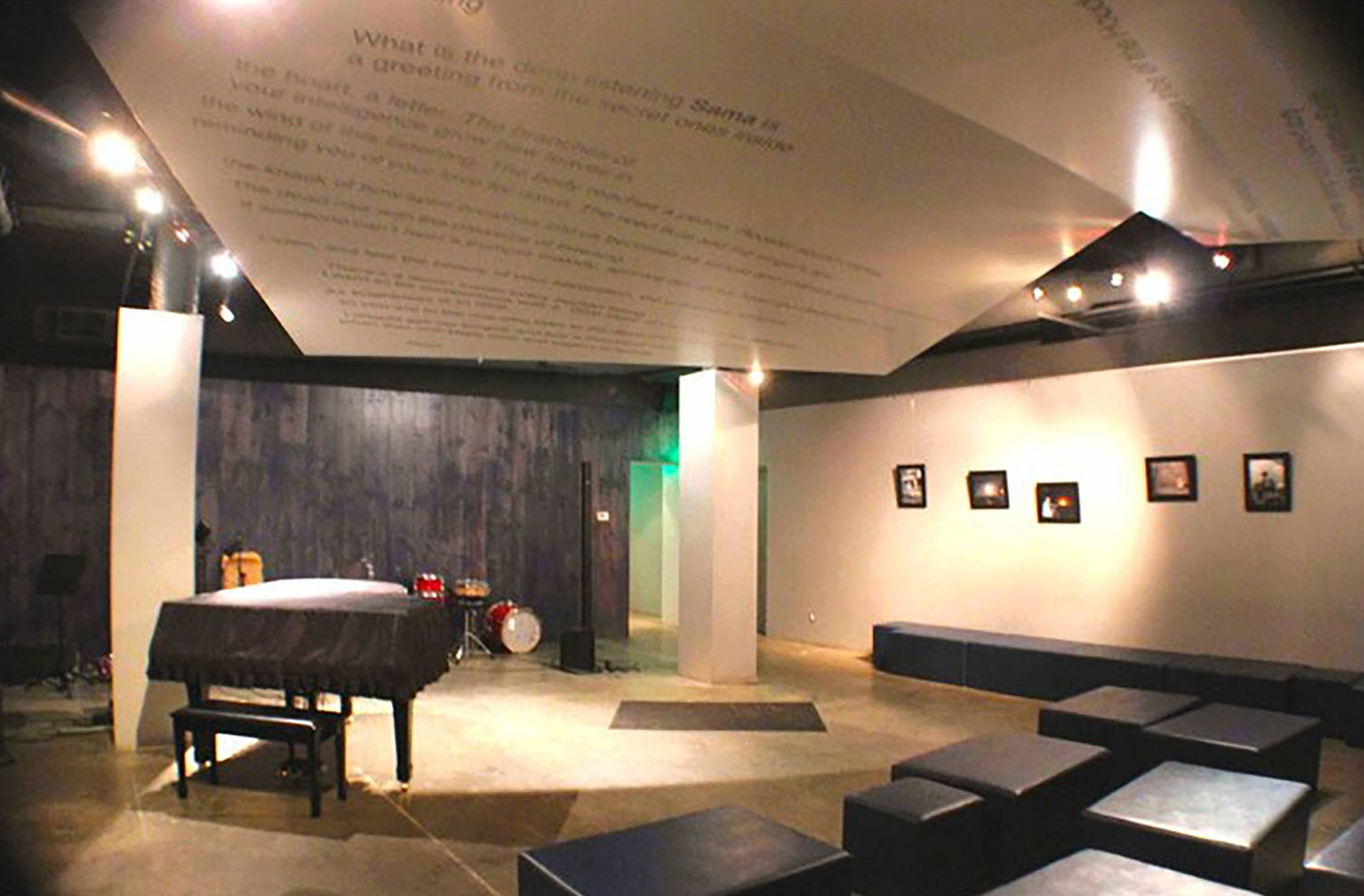 Art gallery room with a covered piano