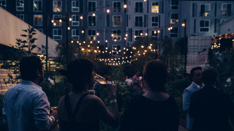 outdoor garden party at night with string lights