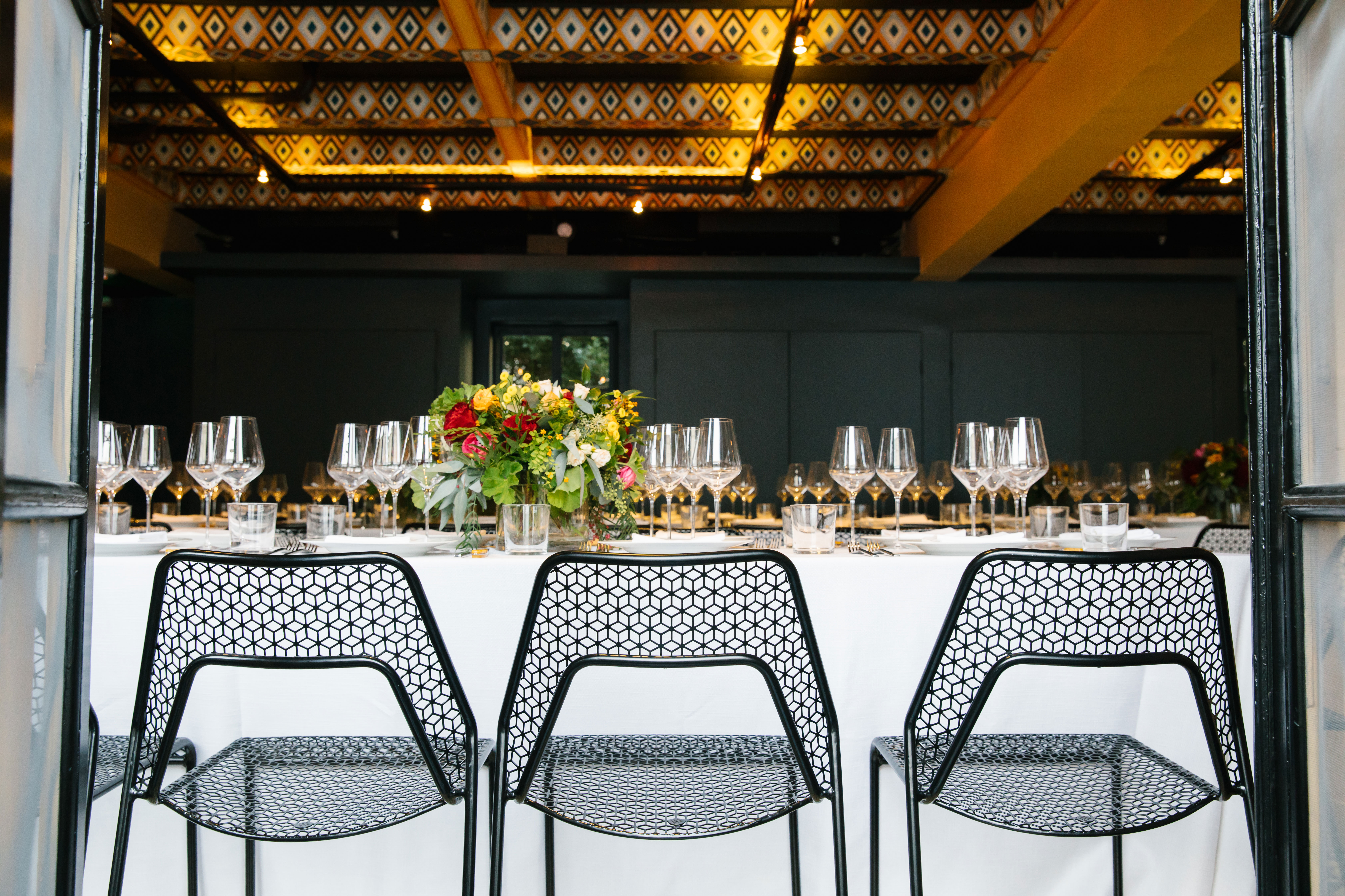 Table Settings and Three Chairs