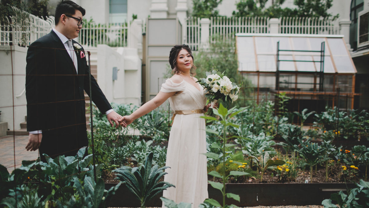 bride and groom in garden