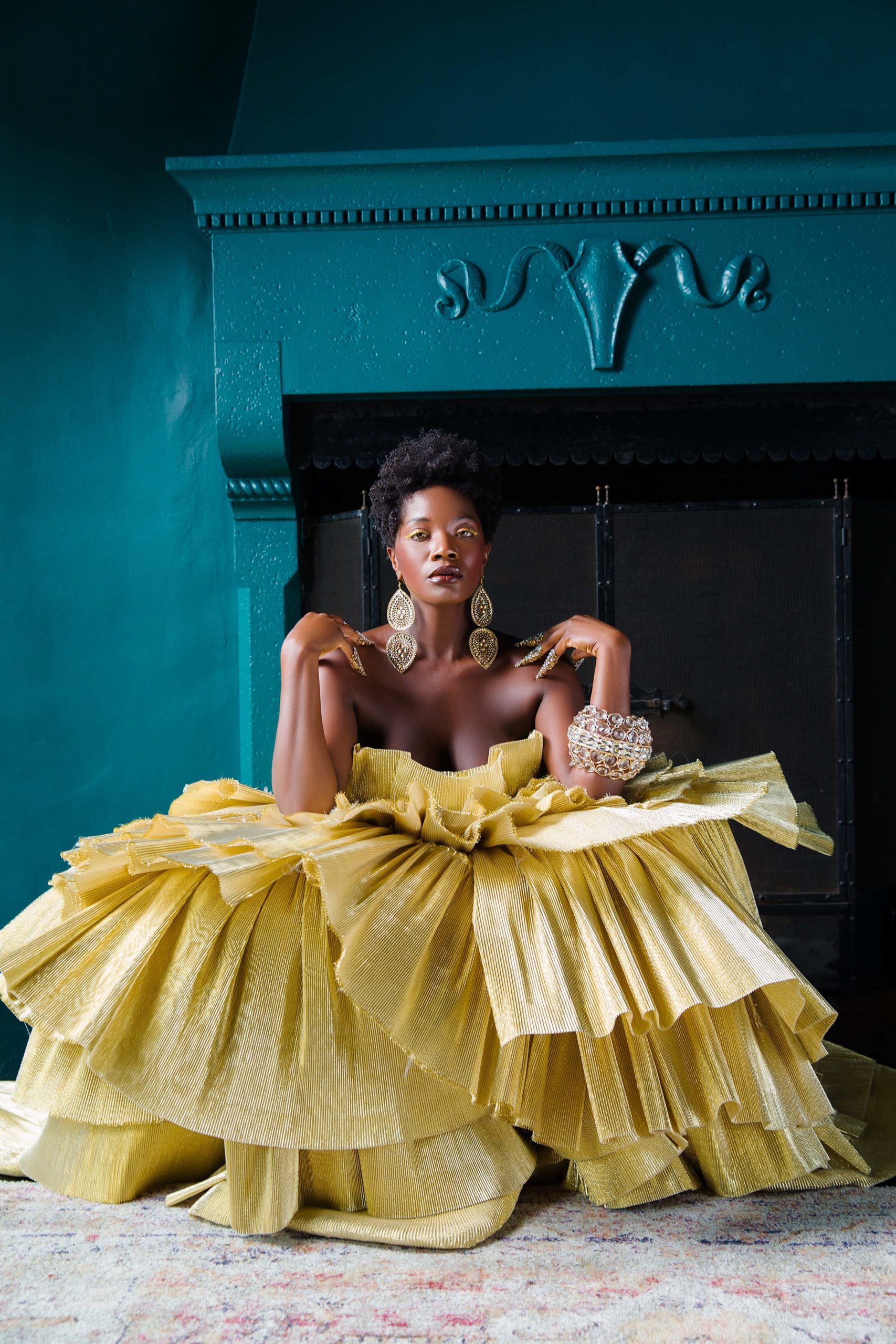 fashion shoot in cardinal's quarters with model in yellow dress