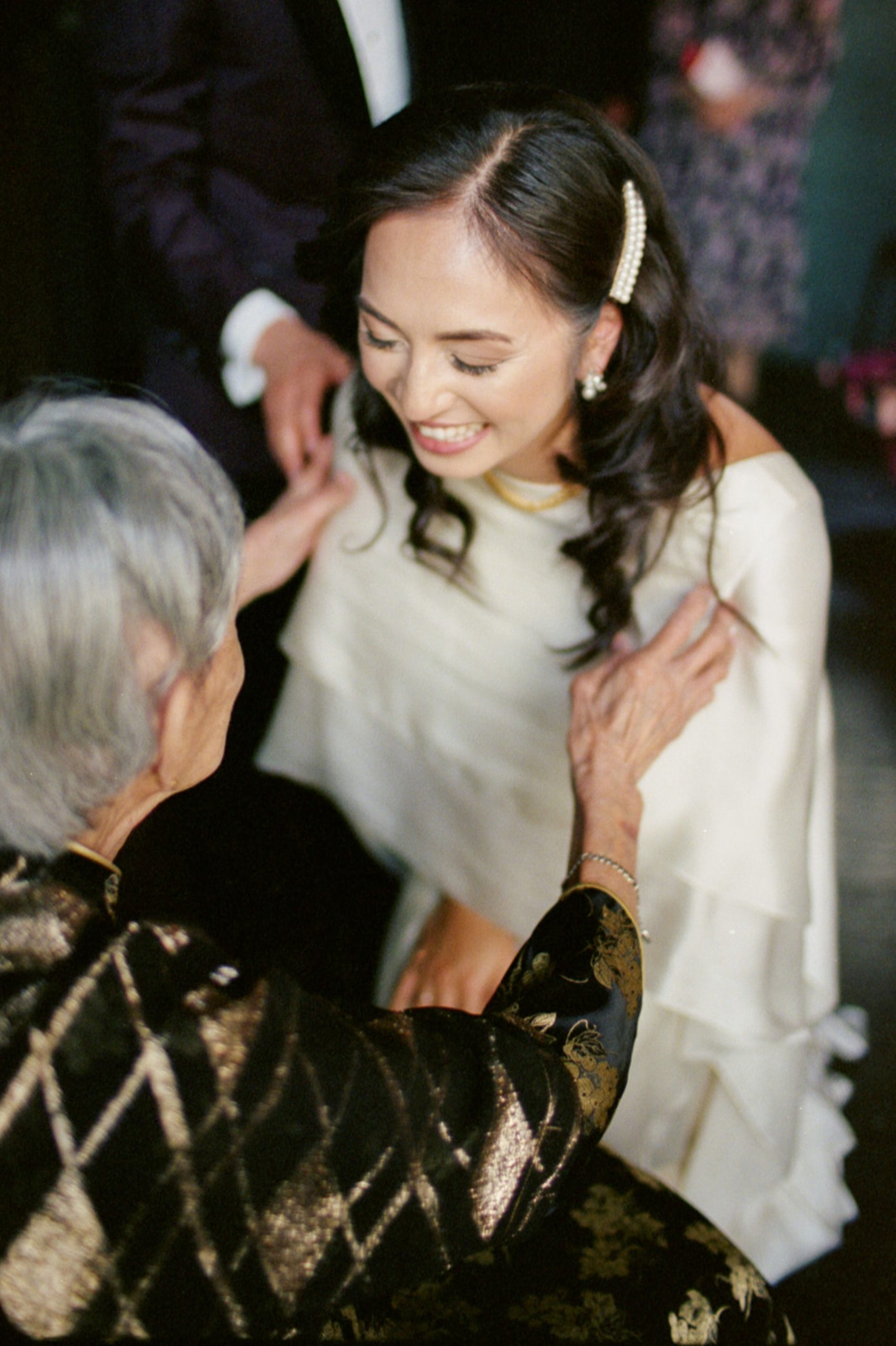 bride hugging her grandmother