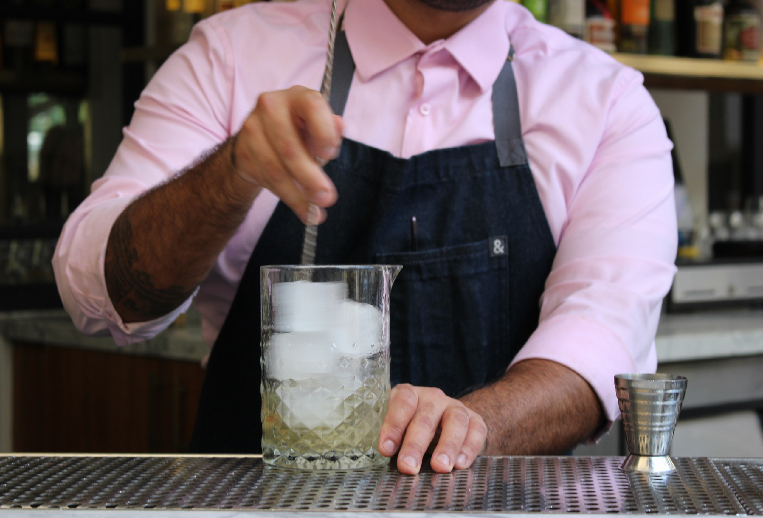 bartender mixing a drink