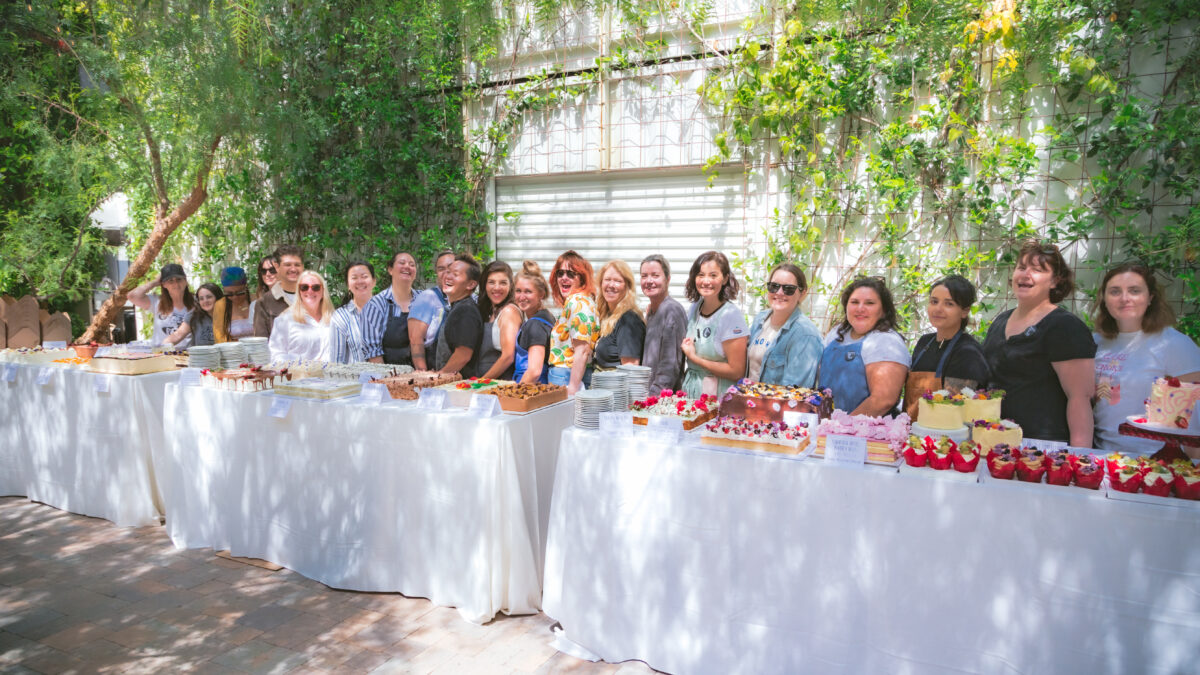 gather for good cake walk photo with all the bakers