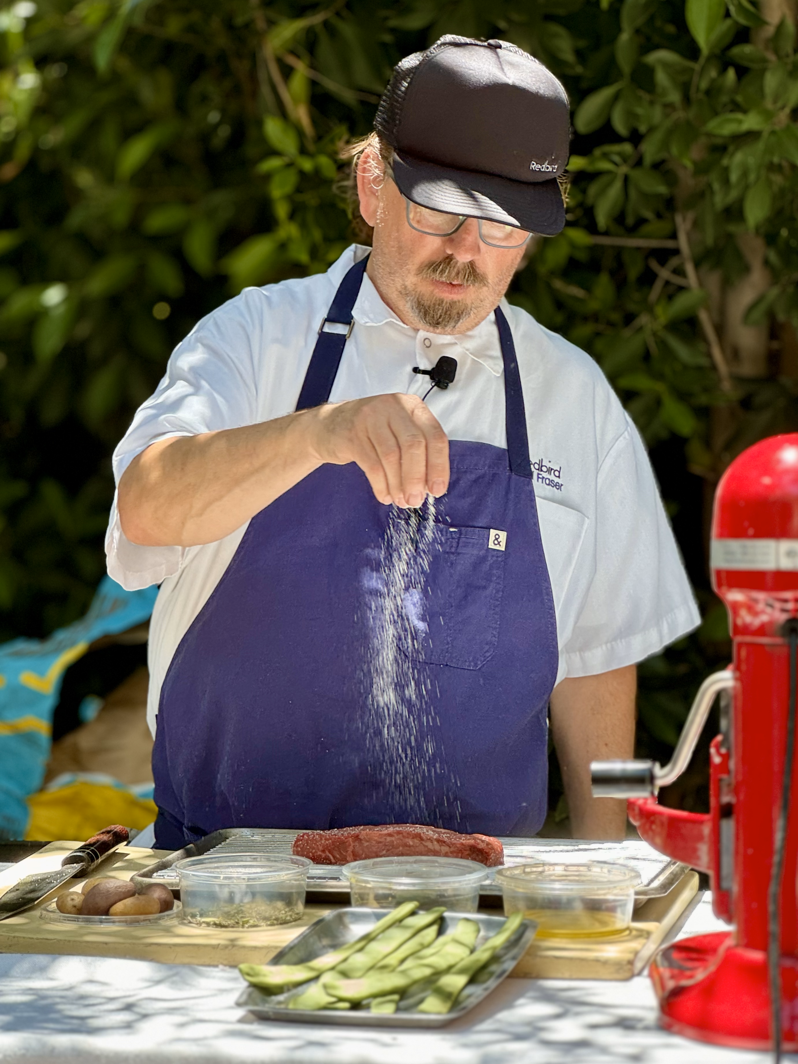 chef neal fraser salting a steak